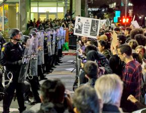 Berkeley protesters against police murder face rows of riot police